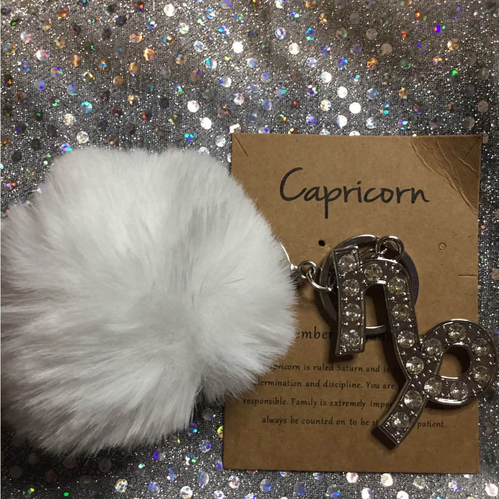 Capricorn Sliver Keychain With White Pom Pom